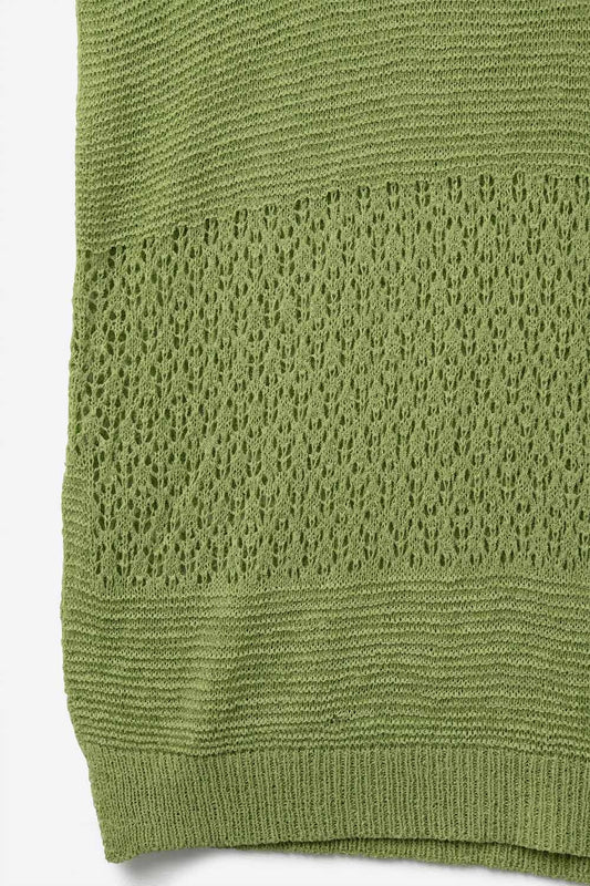Green sweater with soft open knit and dropped sleeves