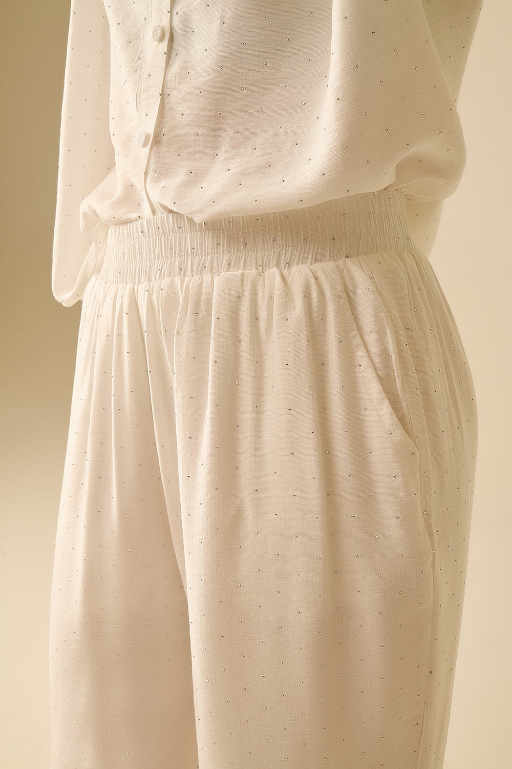 Lightweight wide-legged white pants with strass details - trousers
