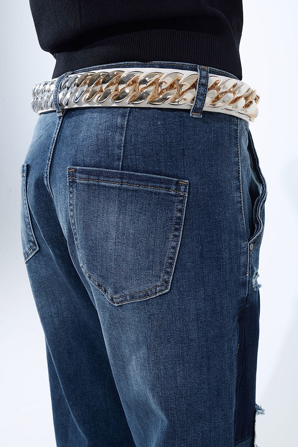 Loose-fitting jeans with distressed patches and paint details - Denim