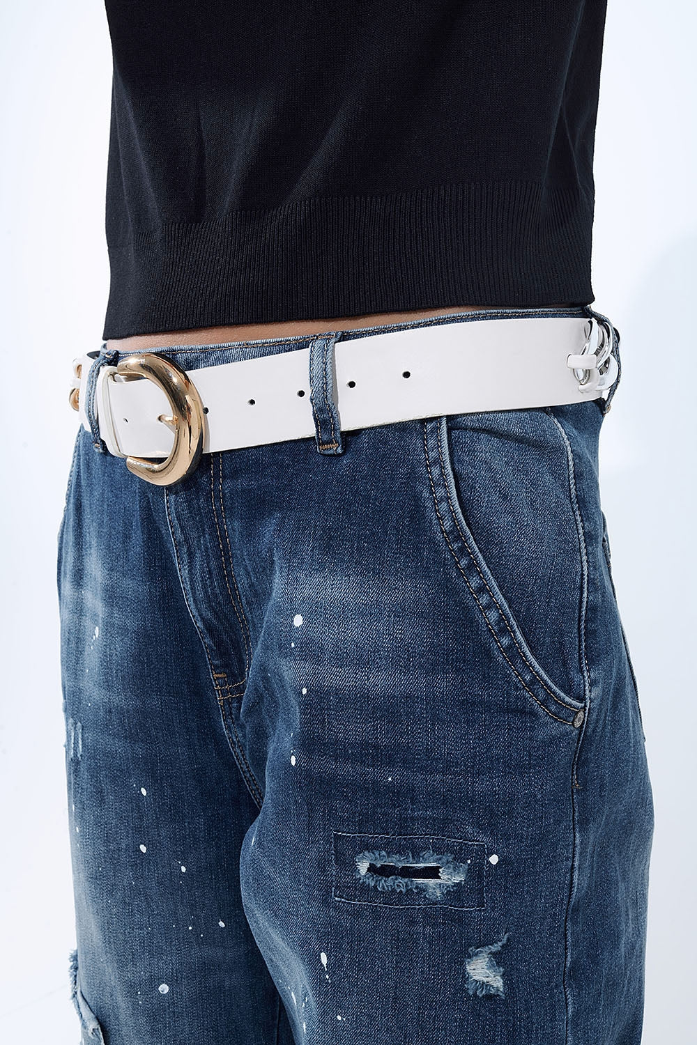 Loose-fitting jeans with distressed patches and paint details - Denim