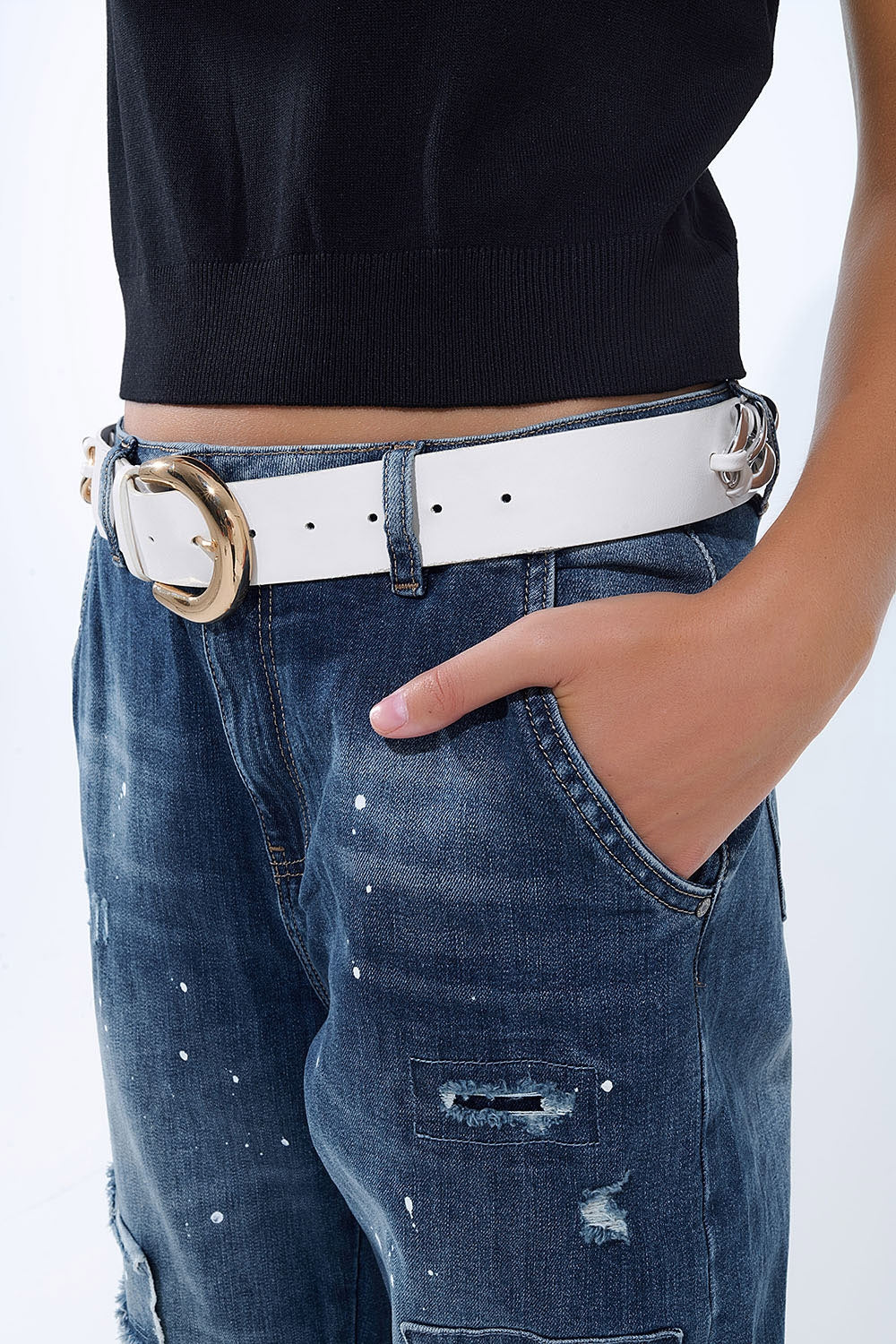 Loose-fitting jeans with distressed patches and paint details - Denim