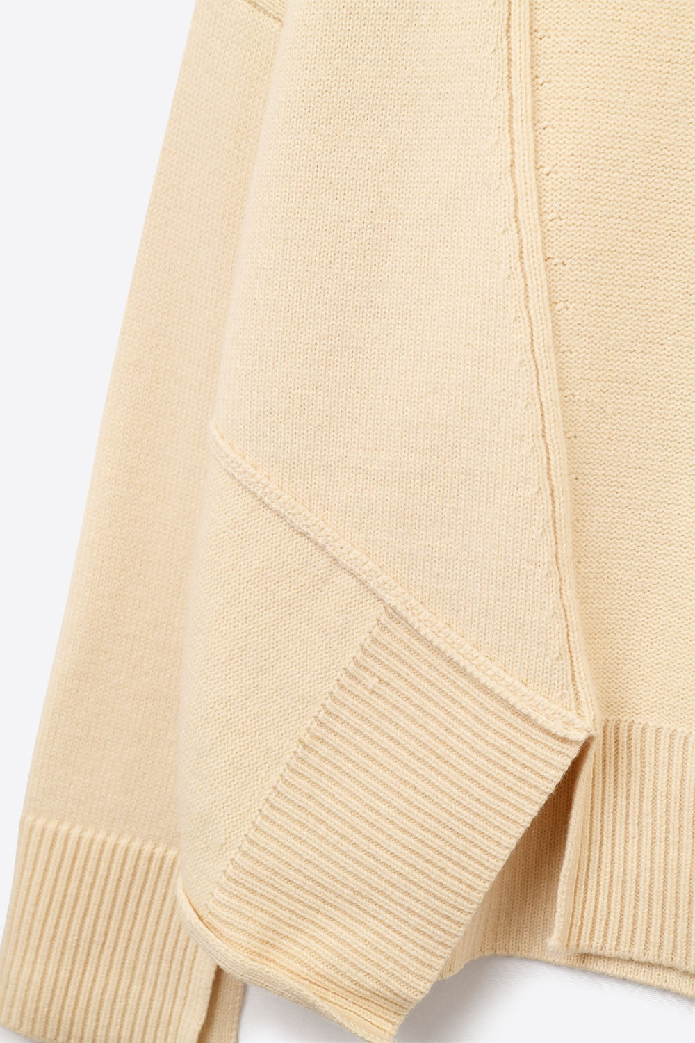 Soft knitted Asymmetric Turtleneck Sweater in beige