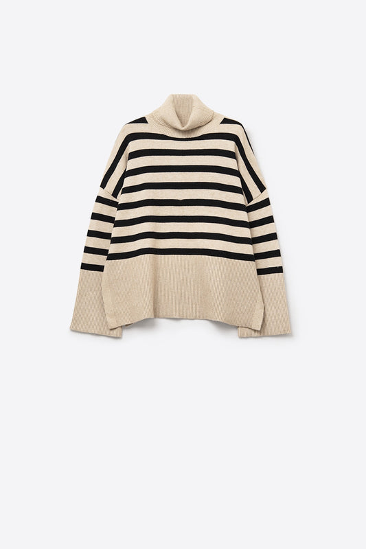 Beige oversized turtleneck sweater with black stripes and splits on the side