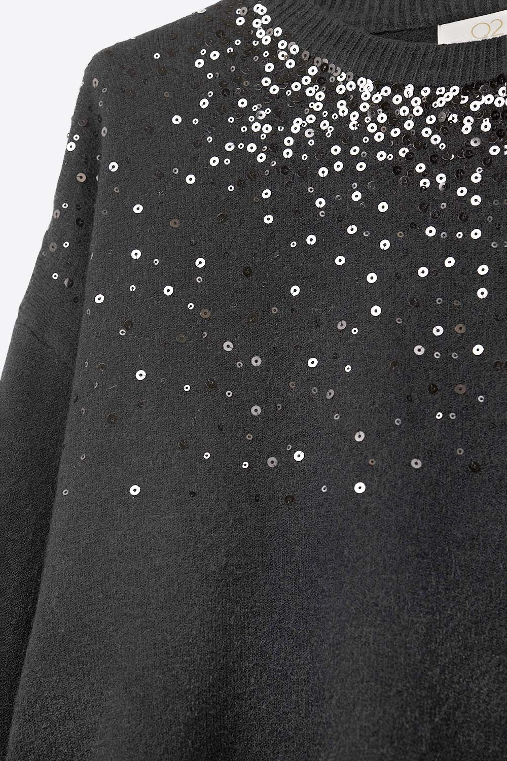 black soft knit sweater embellished with sequins on the front