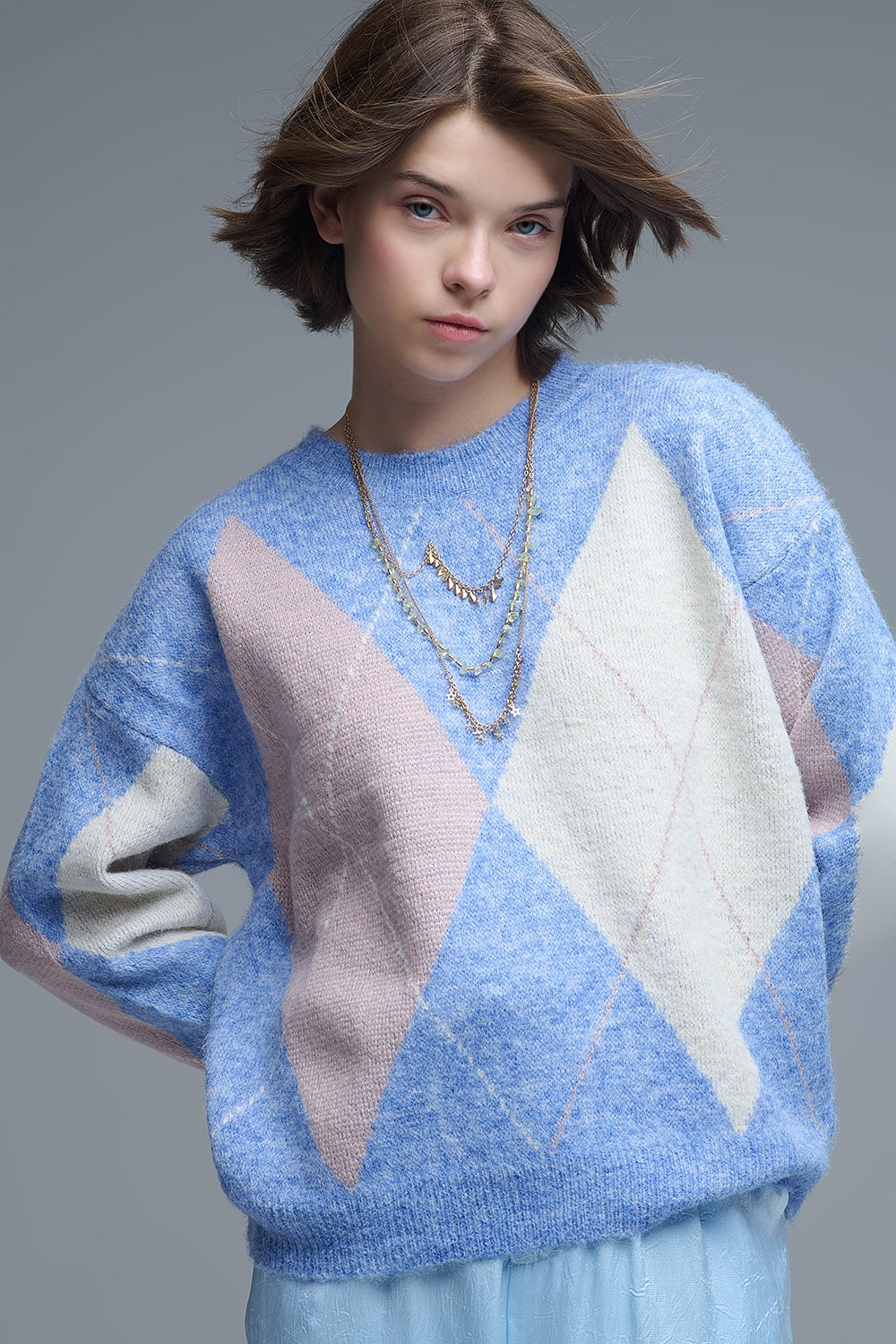 loose sweater in sky blue with diamond patterns