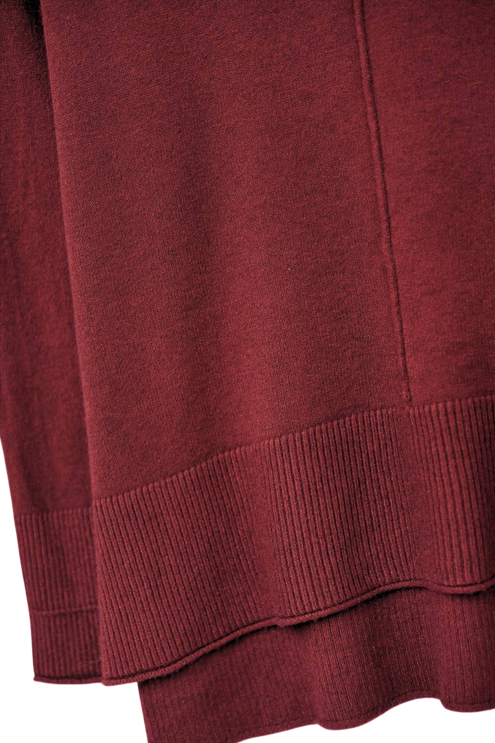 Loose burgundy sweater with open back detail