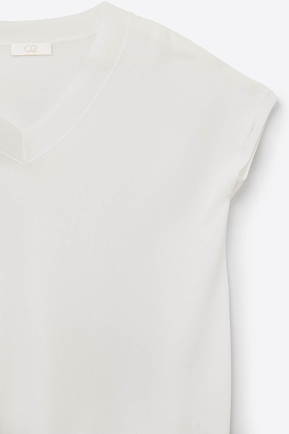 White lightweight knit V-neck sweater with short sleeves