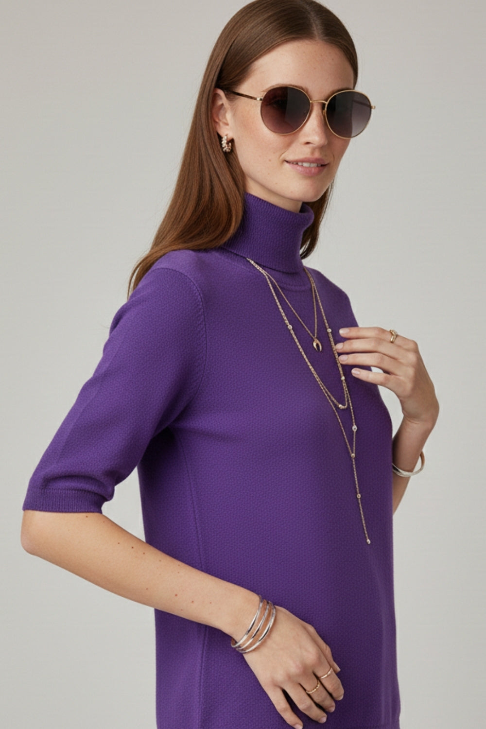Fine knit sweater in purple with a high neck and elbow-length sleeves