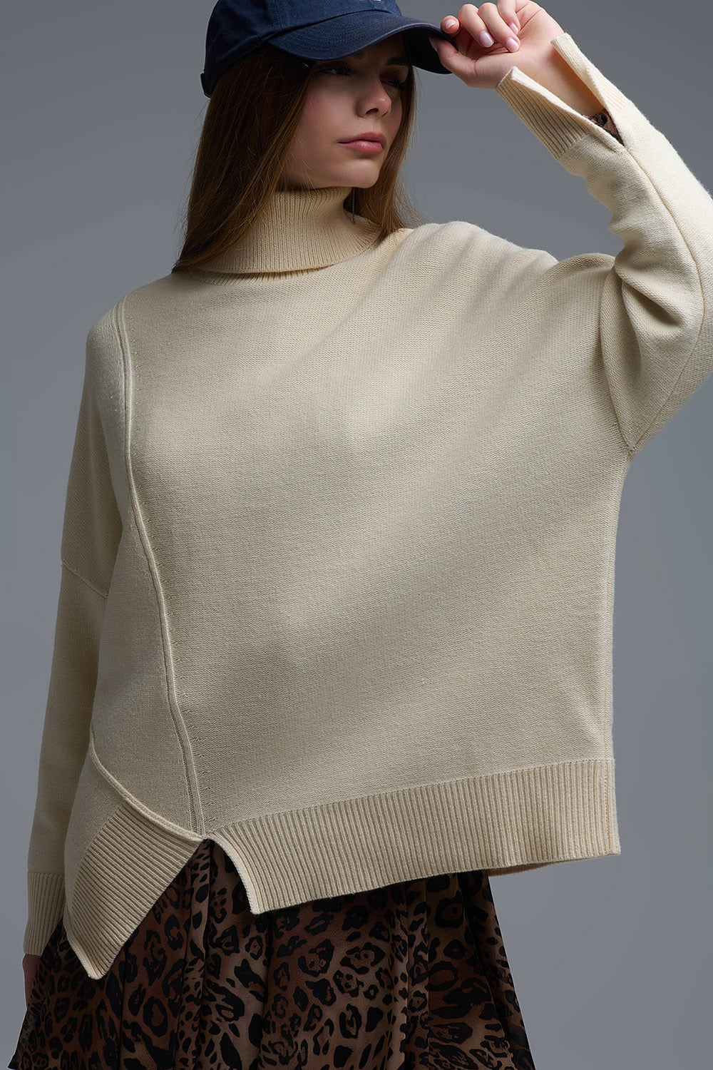 Soft knitted Asymmetric Turtleneck Sweater in beige