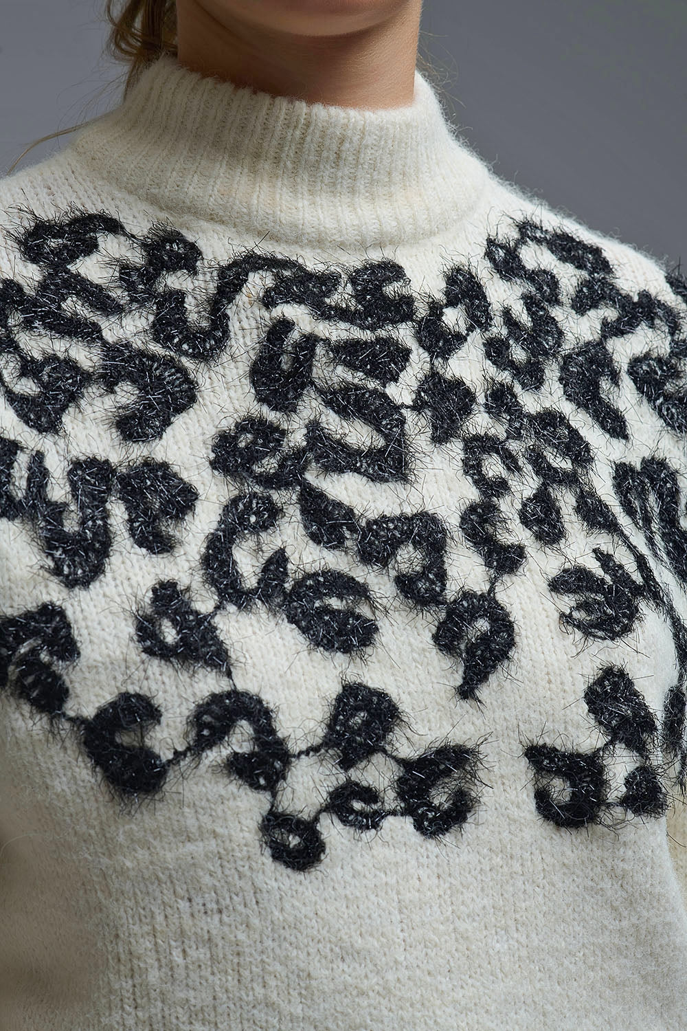 White Knitted Sweater with Abstract Design