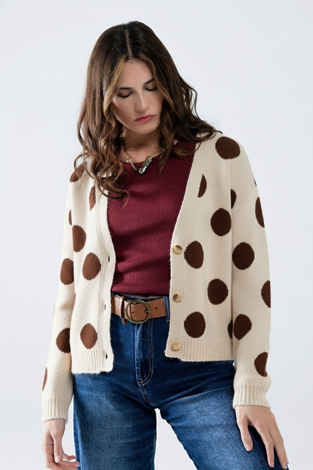 Cream knitted jacket with large brown polka dots and gold buttons
