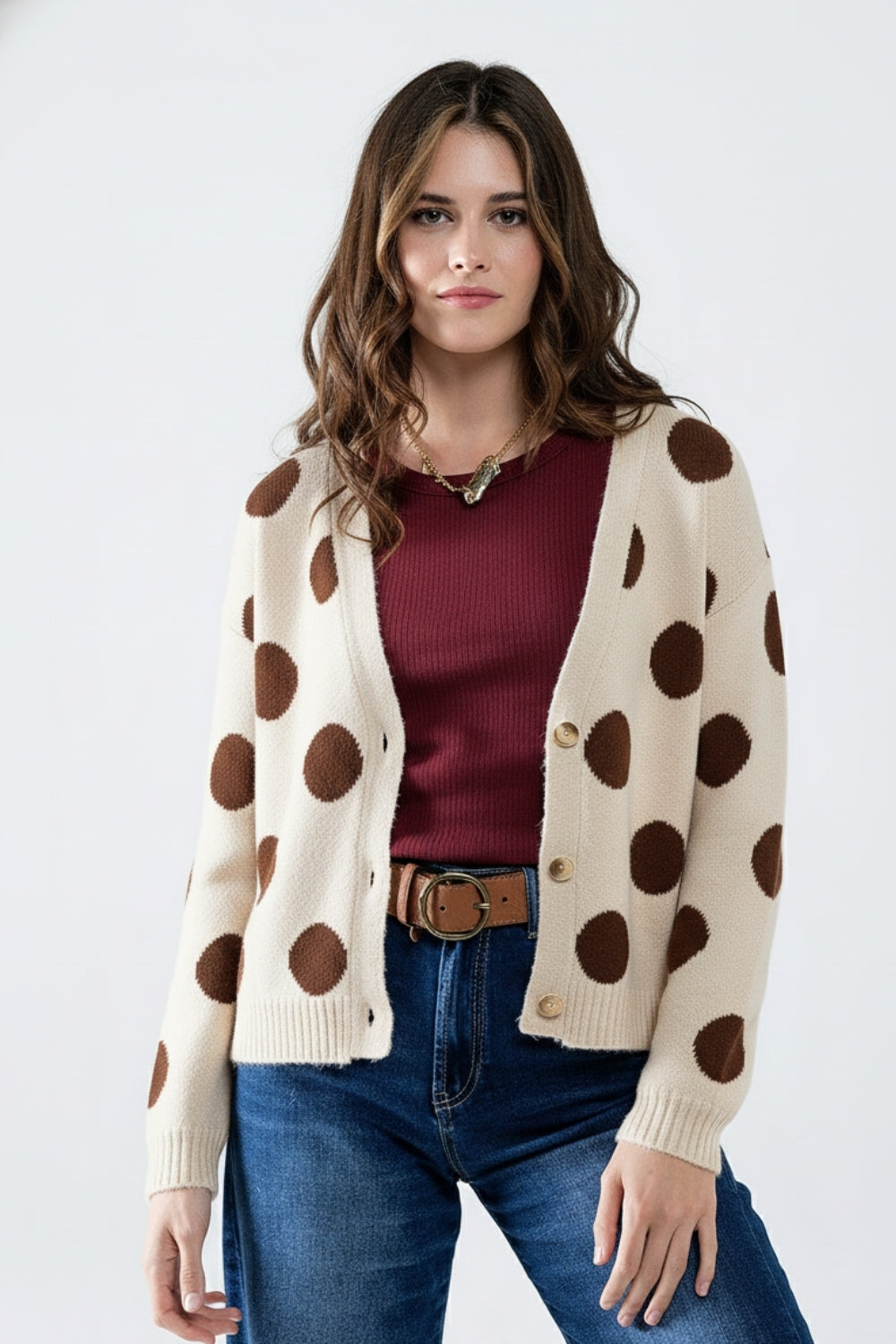 Cream knitted jacket with large brown polka dots and gold buttons