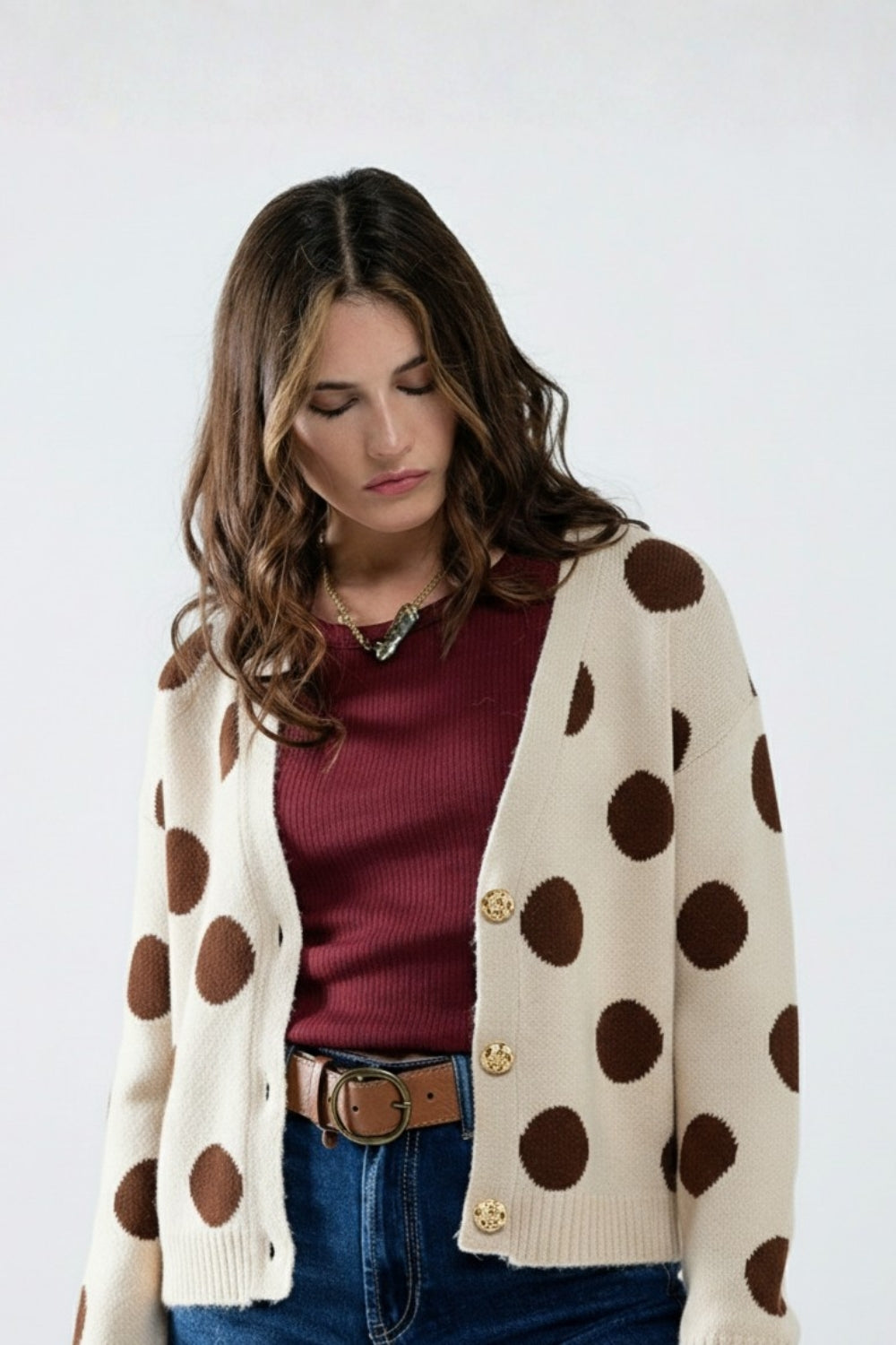 Cream knitted jacket with large brown polka dots and gold buttons