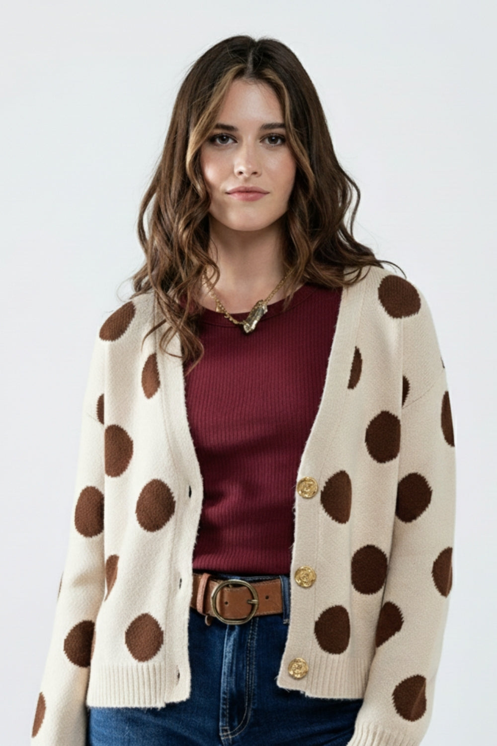 Cream knitted jacket with large brown polka dots and gold buttons