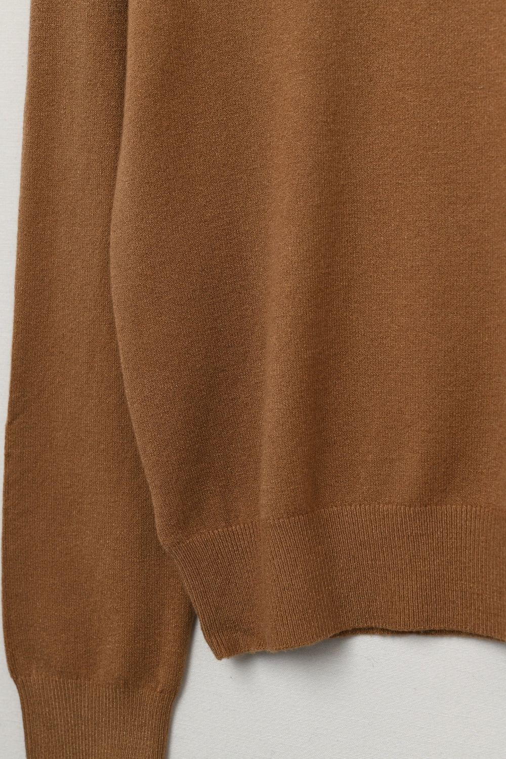 camel-colored turtleneck sweater in fine merino wool knit