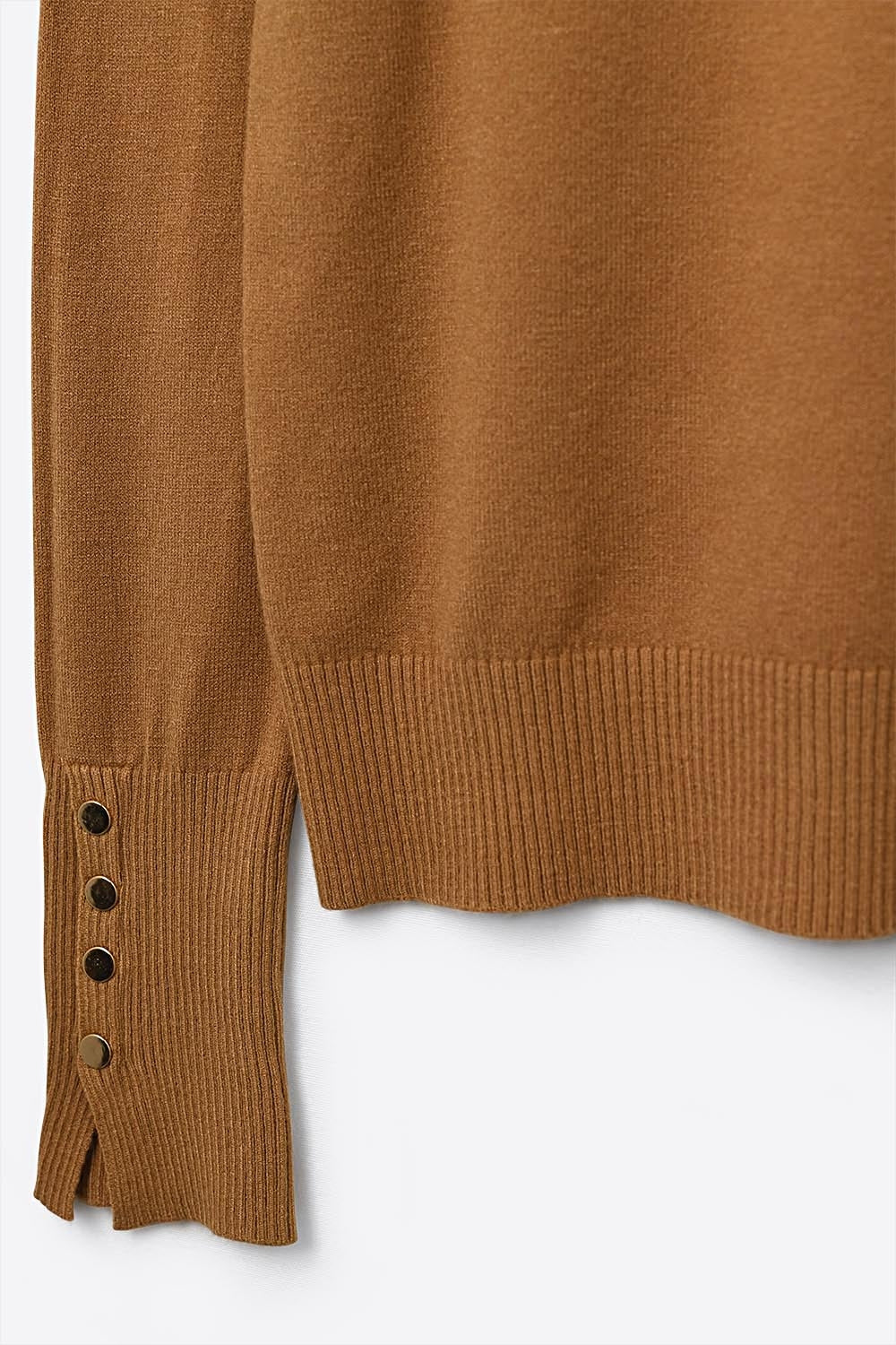 Camel turtleneck sweater with gold buttons on the cuff