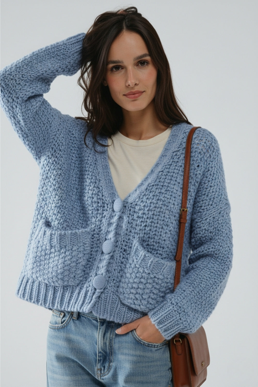 Oversized light blue chunky knit jacket with pockets