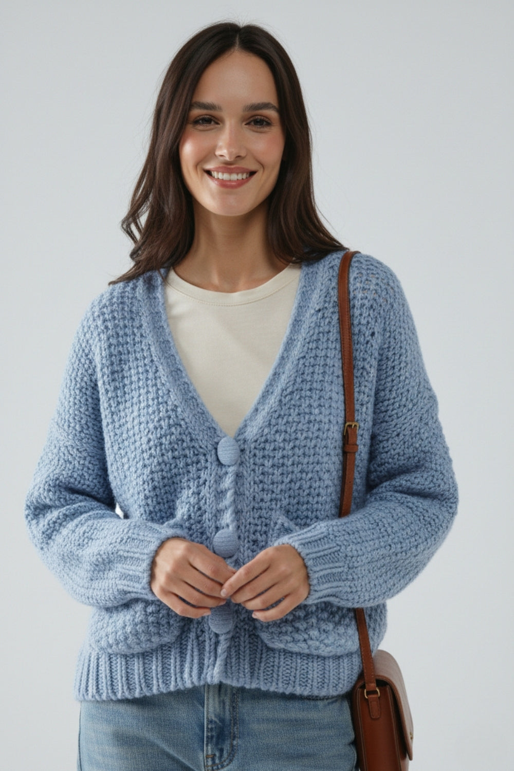 Oversized light blue chunky knit jacket with pockets