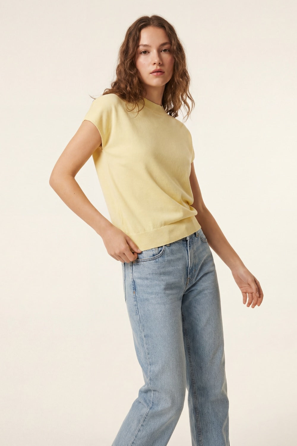 yellow turtleneck sweater with fitted short sleeves