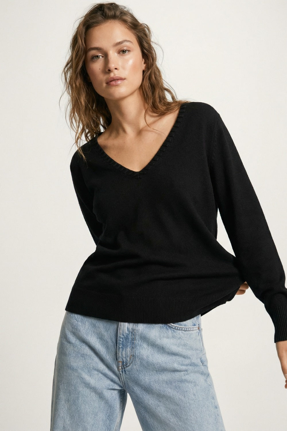 Fine Knit V-Neck Sweater with Decorative Neckline Detail in black color