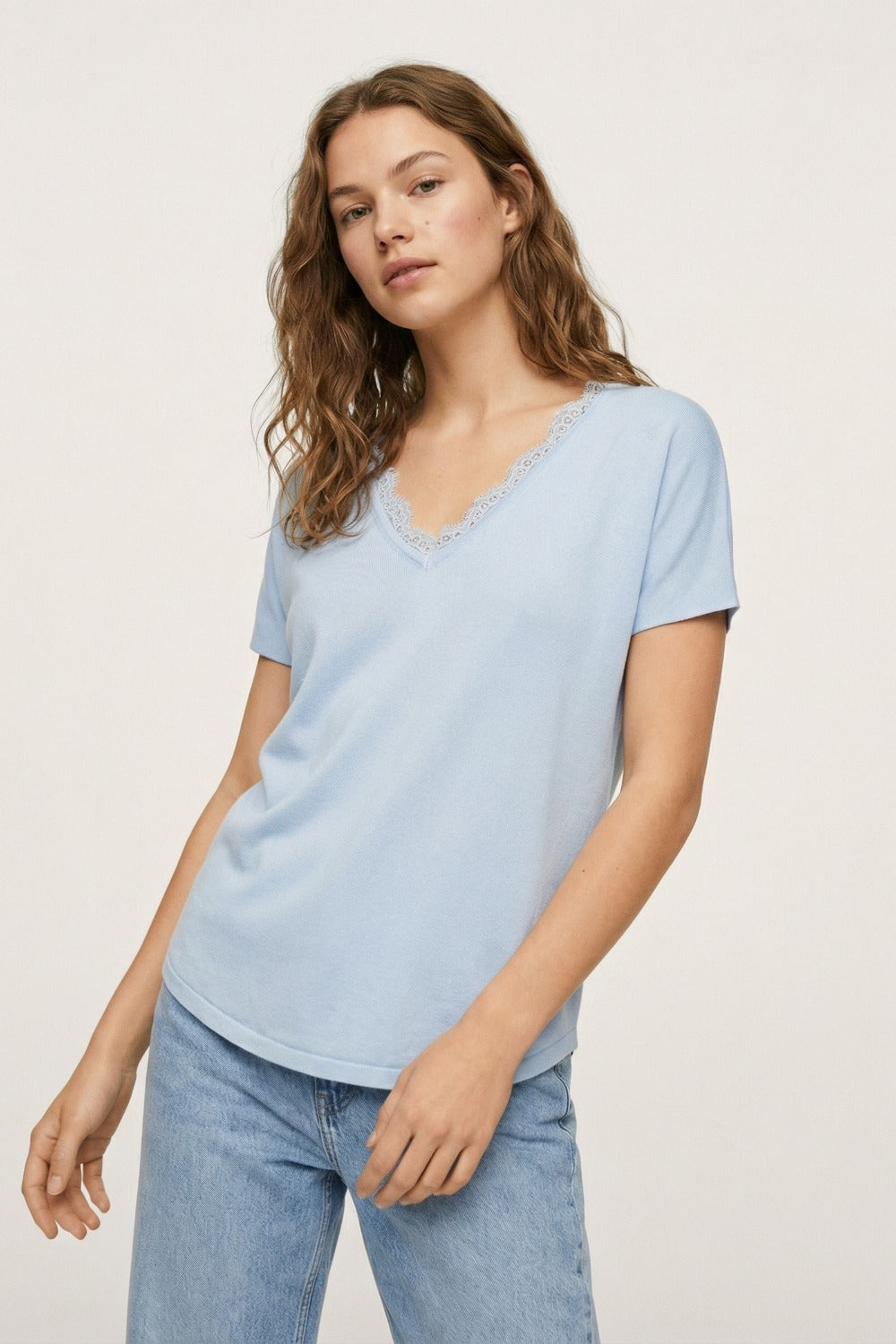 Fine and soft knit sweater with V-neck and lace trim in baby blue
