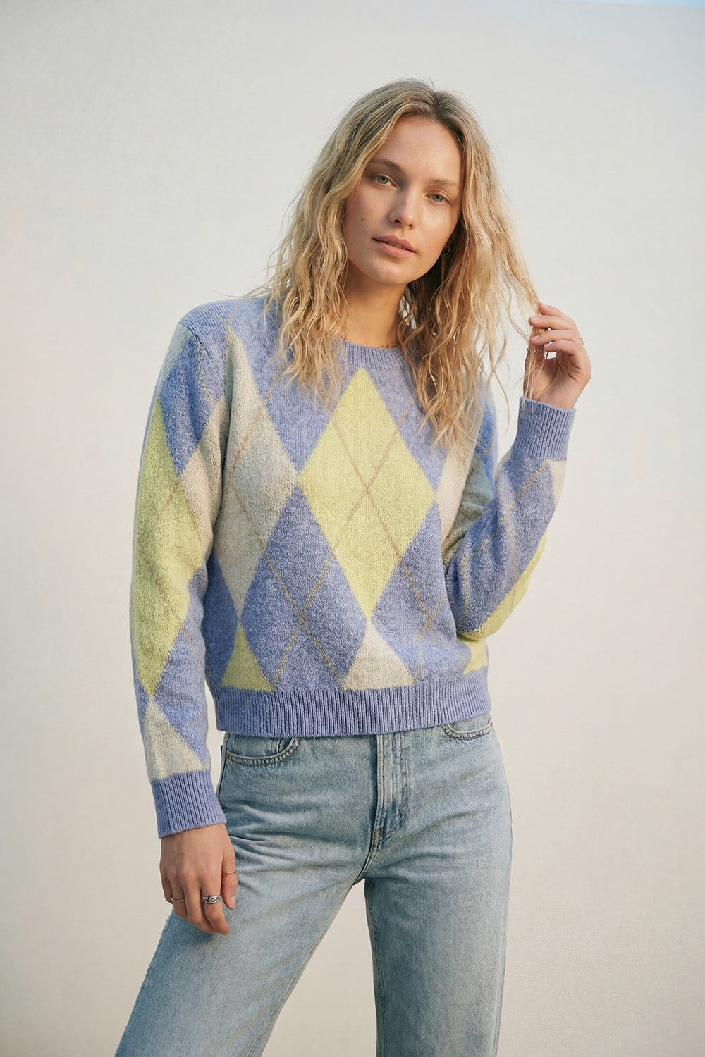 Blue and yellow diamond patterned sweater in soft fluffy knit
