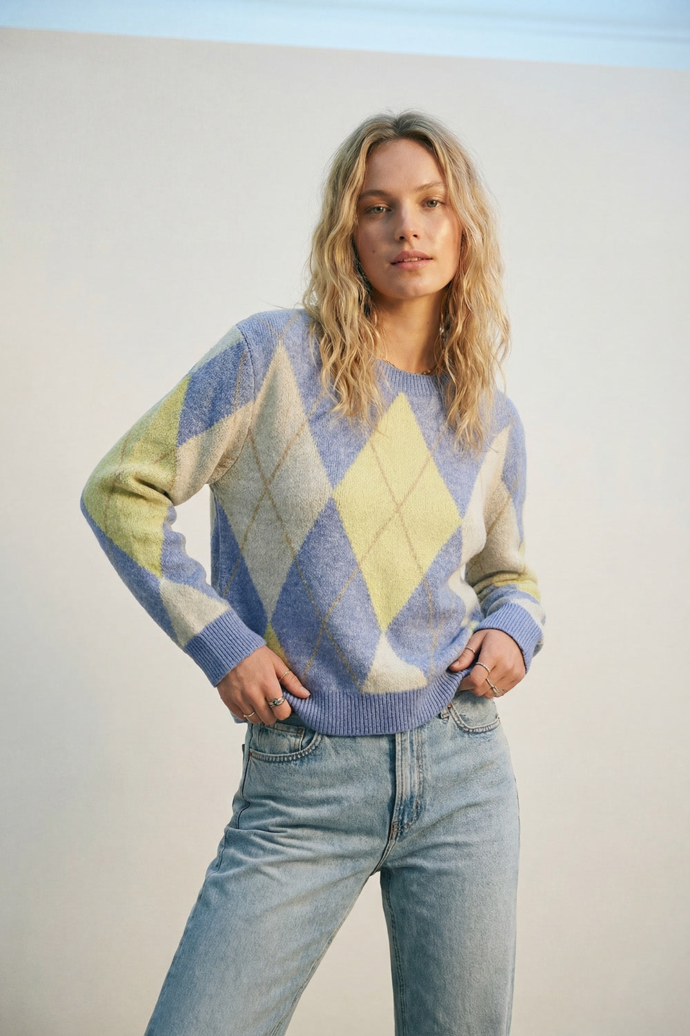 Blue and yellow diamond patterned sweater in soft fluffy knit