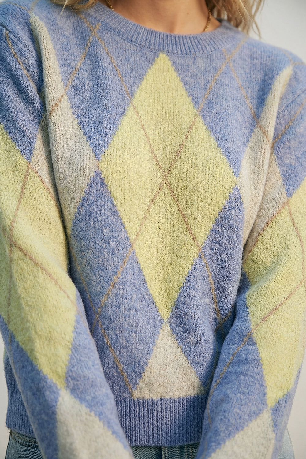 Blue and yellow diamond patterned sweater in soft fluffy knit