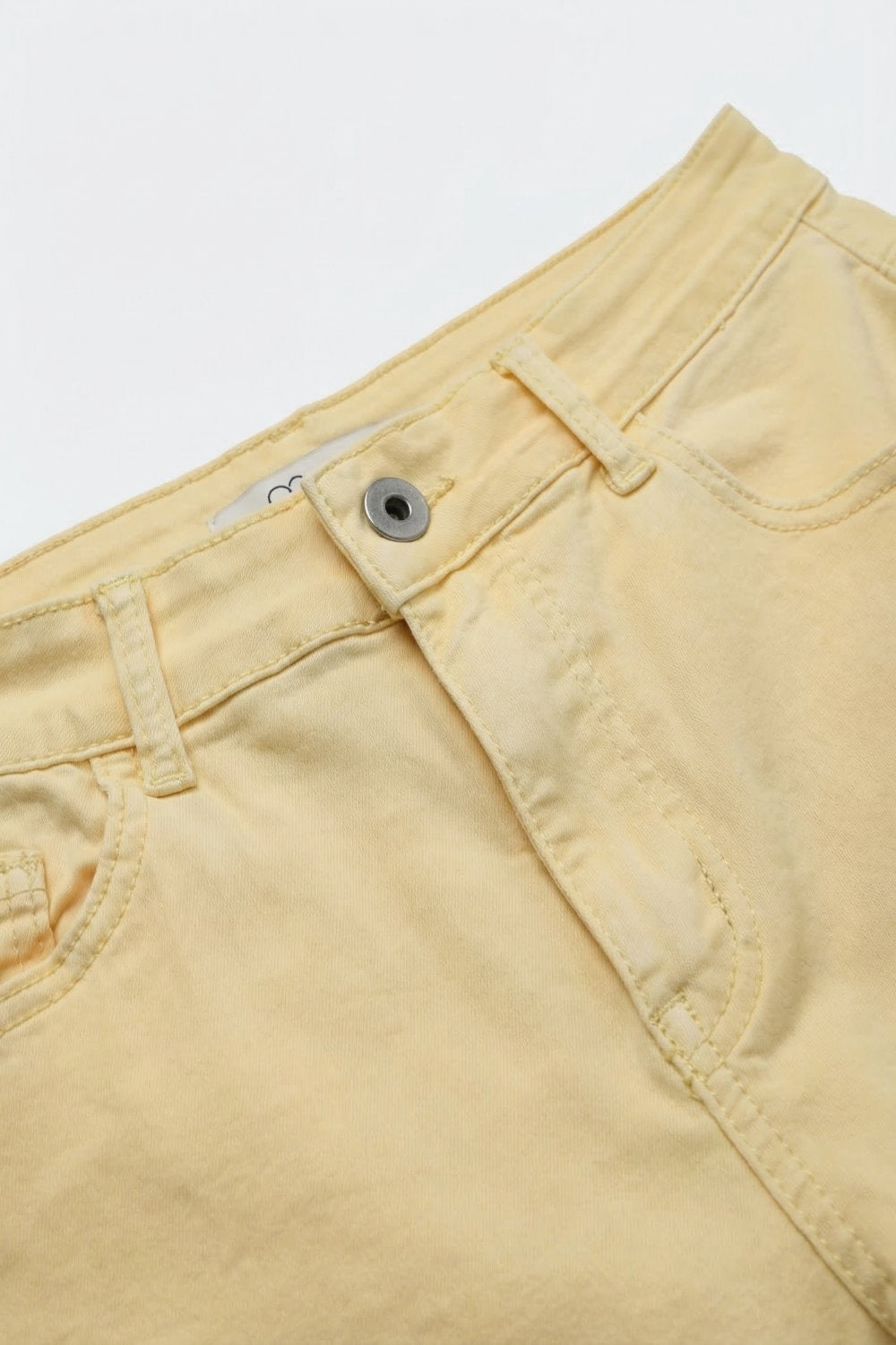 Stretch-denim Bermuda shorts in Butter Yellow - trousers