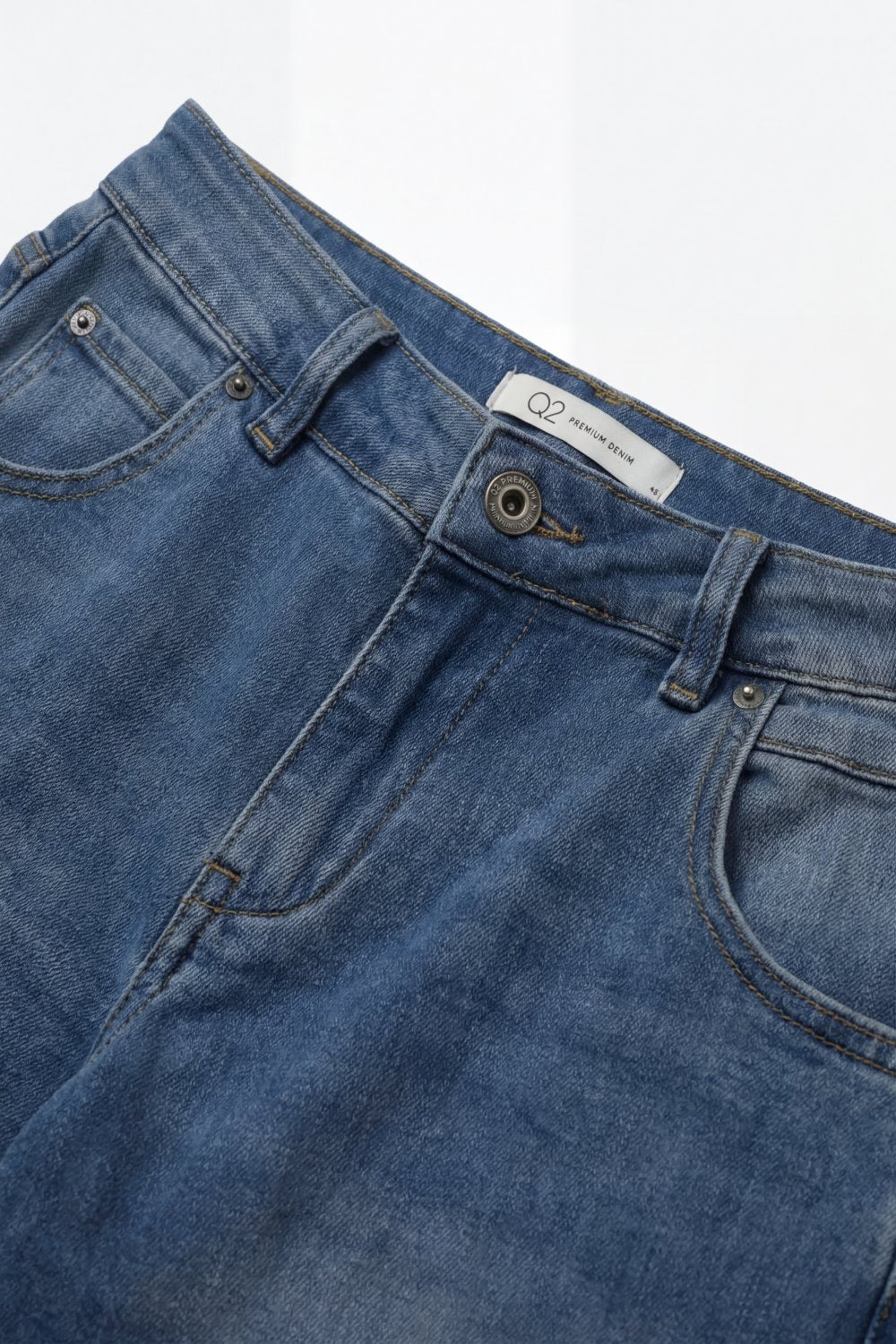 Mid-Wash Curved-Leg Jeans with Folded Hem Seam - Denim