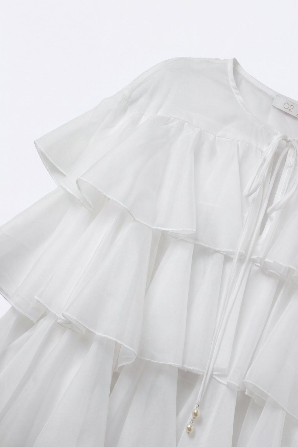 White Tiered Ruffle Peplum Blouse with Tie Neck - Shirts