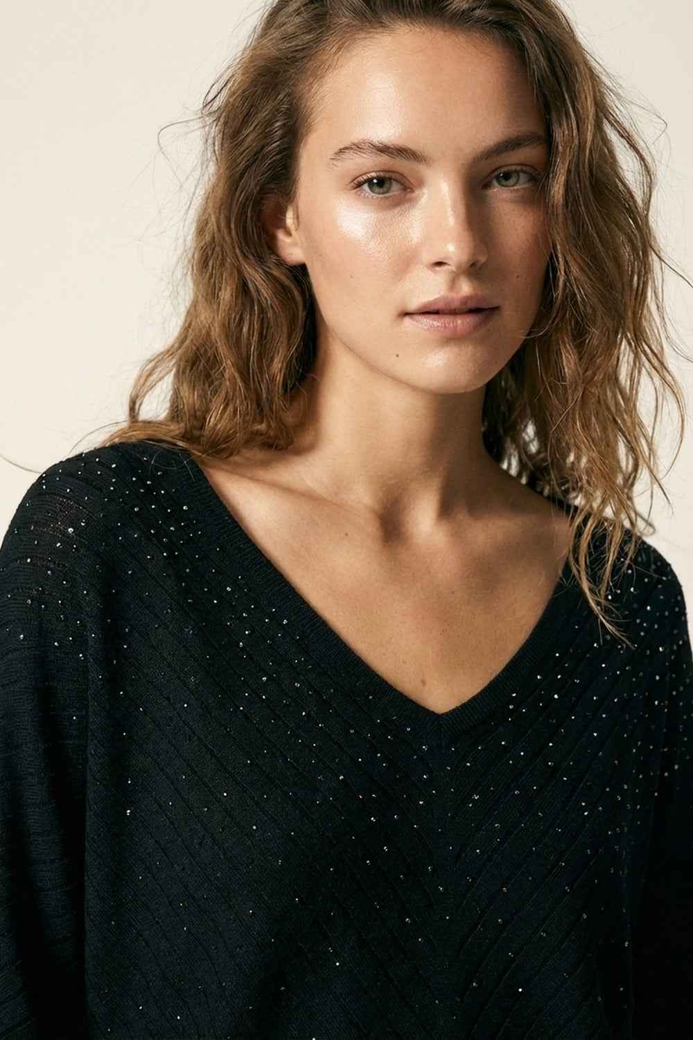 Black Embellished V-Neck Knit Top with Flared Silhouette