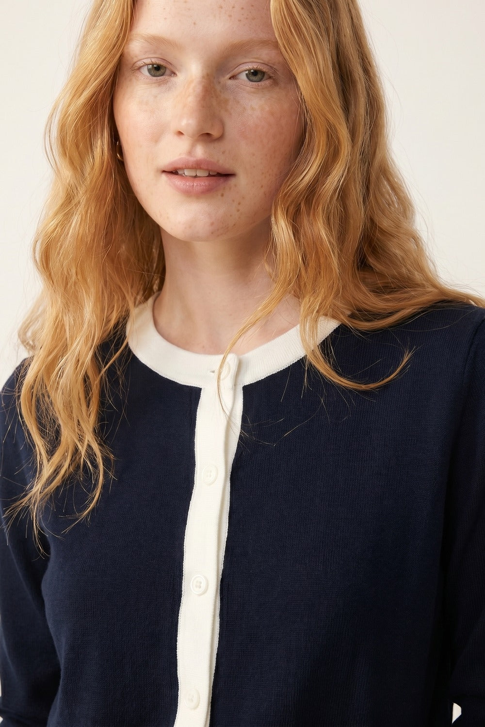 Navy Button-Up Cardigan with White Trim Accents