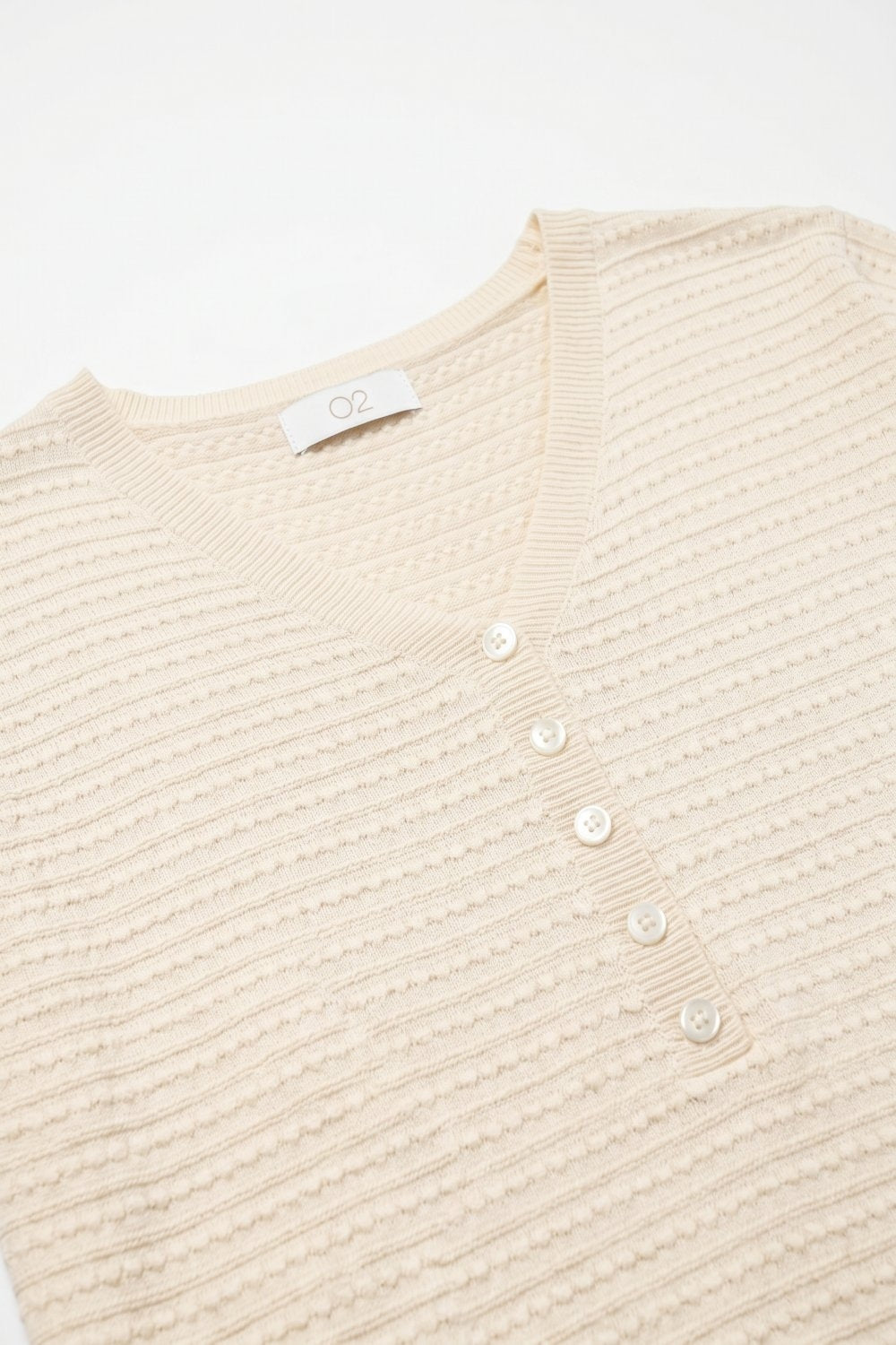 Textured Fine Knit Button Detail Short Sleeve sweater in beige -