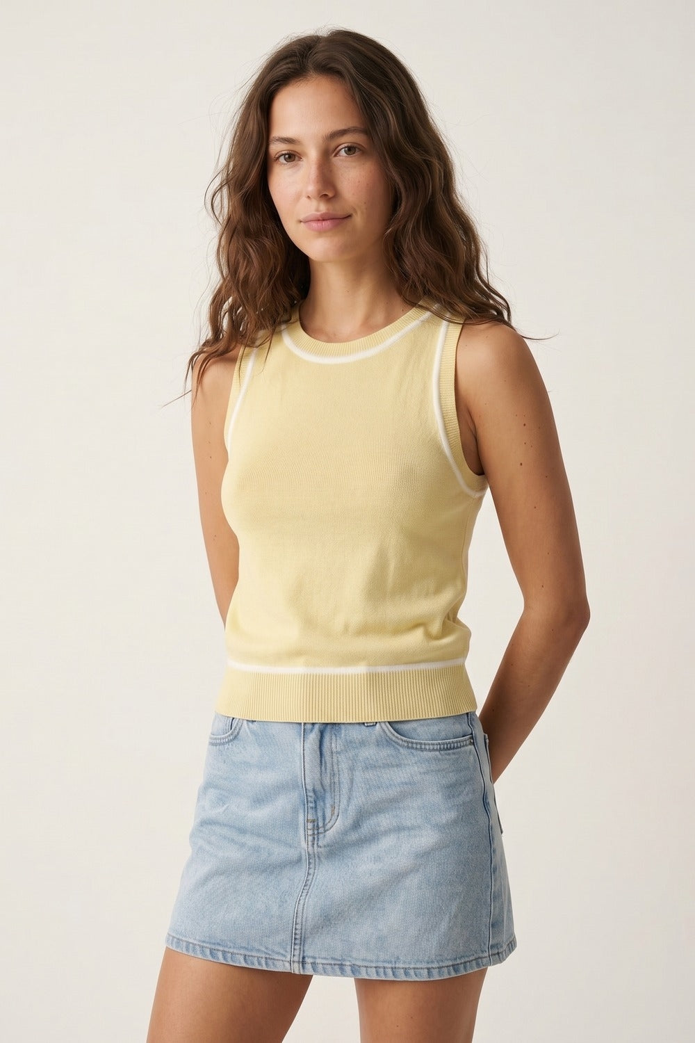 Sleeveless Knitted top In butter yellow Featuring detail white Lines