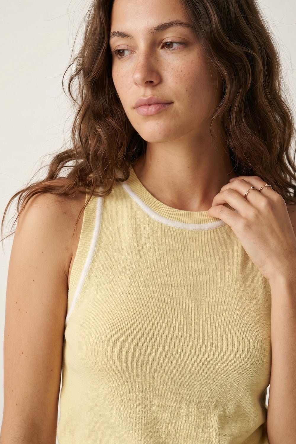 Sleeveless Knitted top In butter yellow Featuring detail white Lines