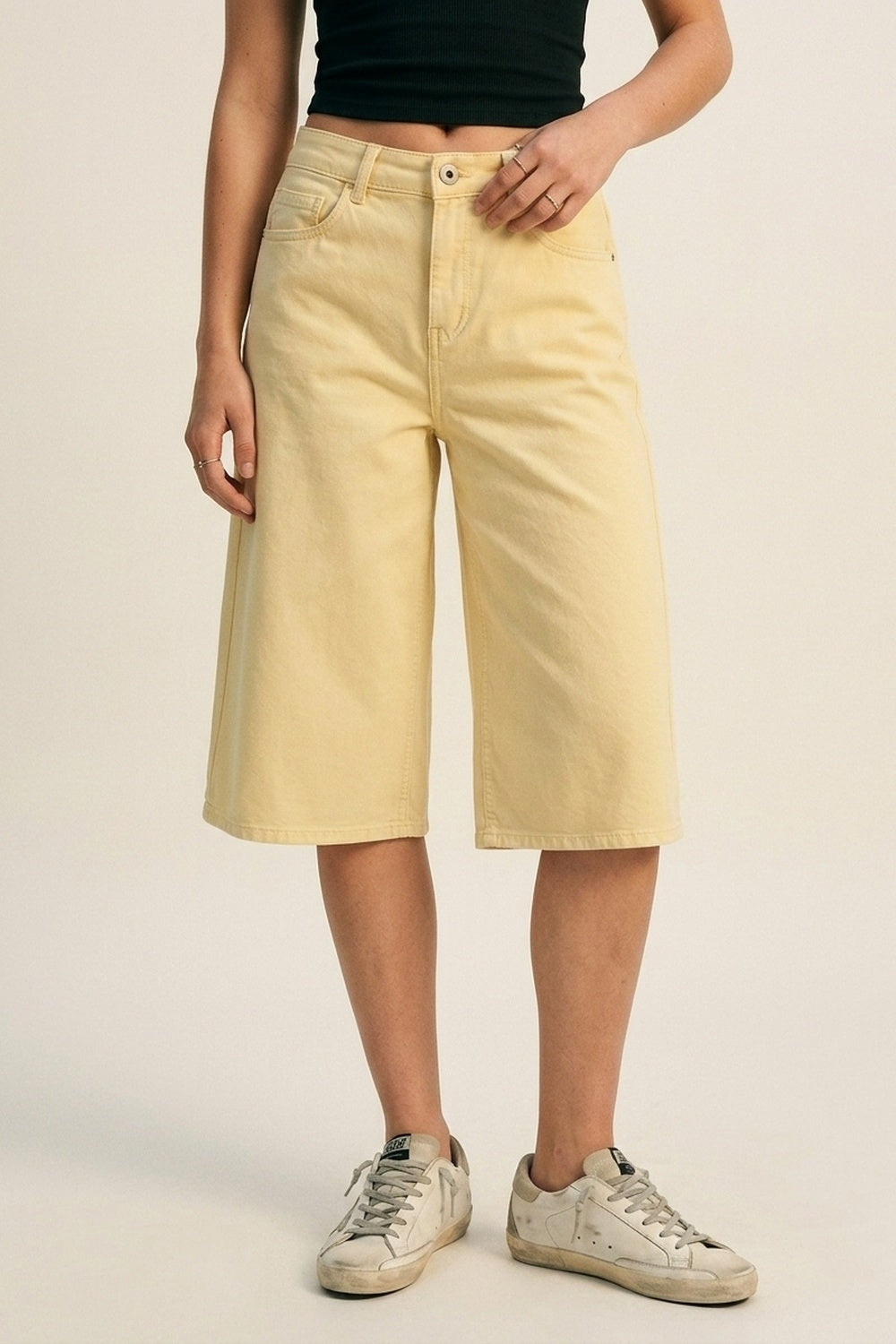Stretch-denim Bermuda shorts in Butter Yellow - trousers