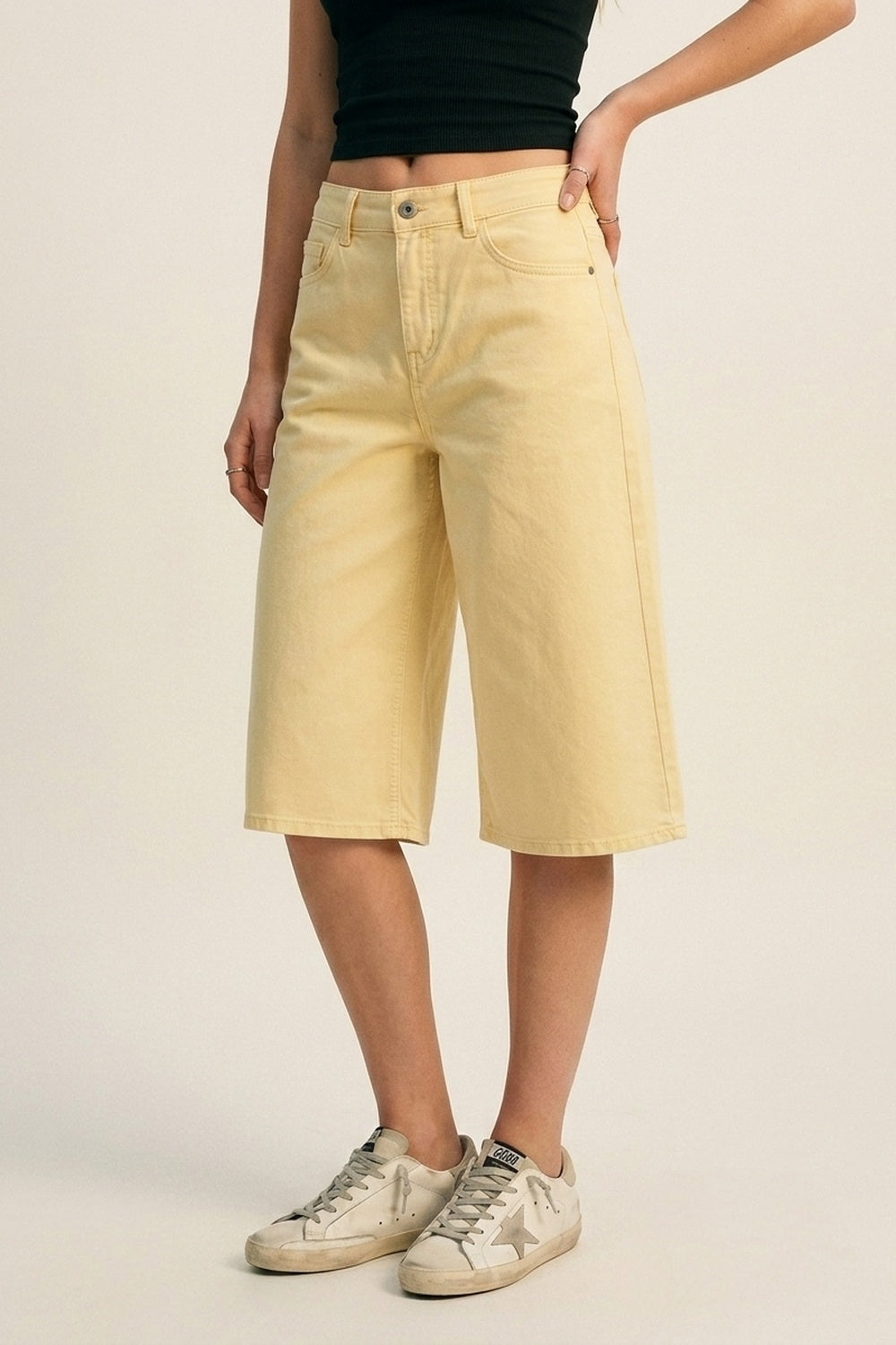 Stretch-denim Bermuda shorts in Butter Yellow - trousers