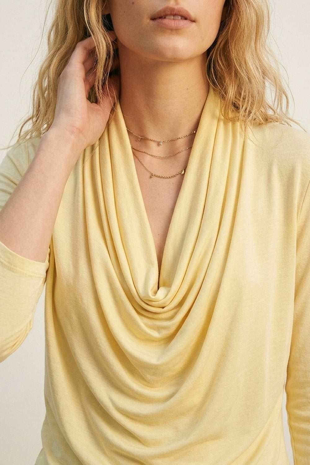 butter yellow front draped top with 3/4 sleeve