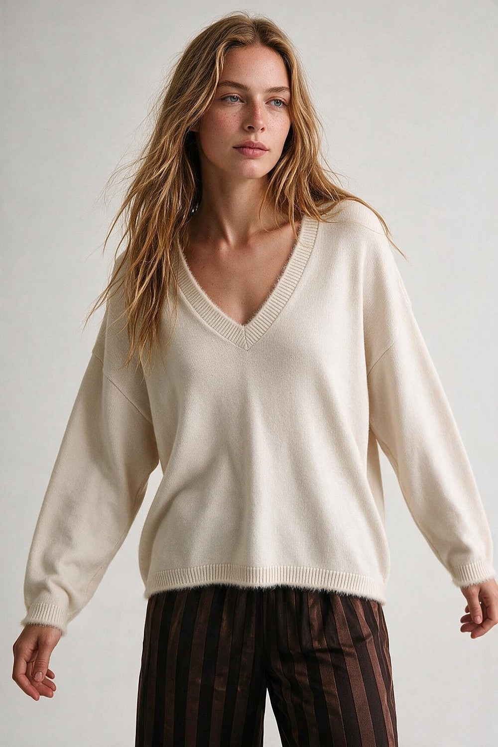 Cream V-Neck Sweater with Faux Fur Trim