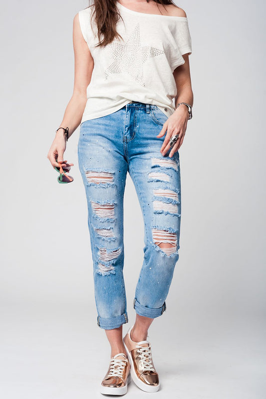 Mom jeans with extreme rips and paint splatter - Denim
