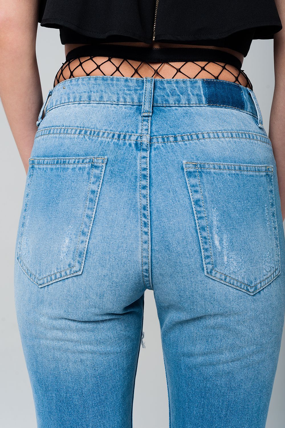 Ripped mom jeans with fishnet tights - Denim