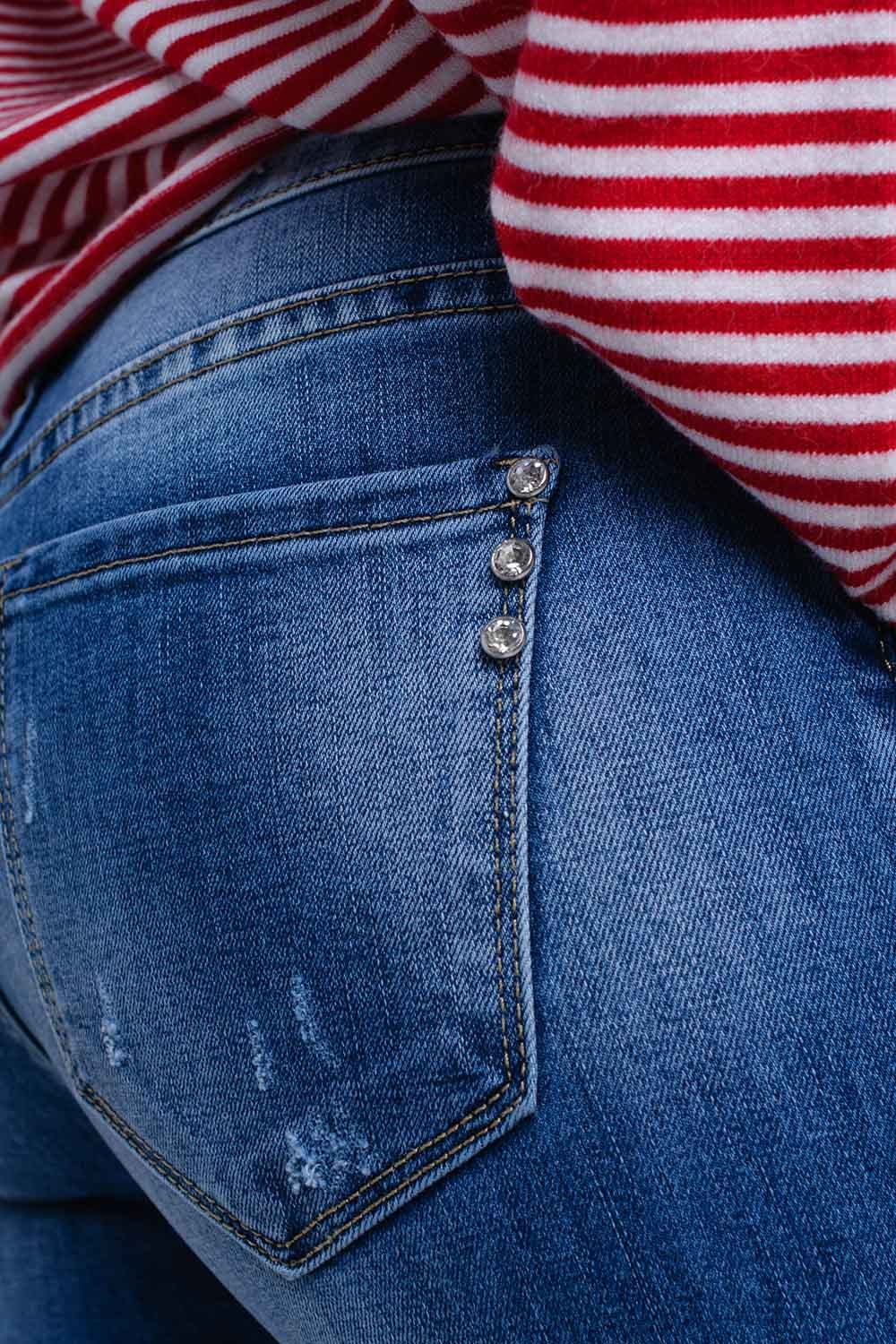 Distressed skinny jeans with fringes