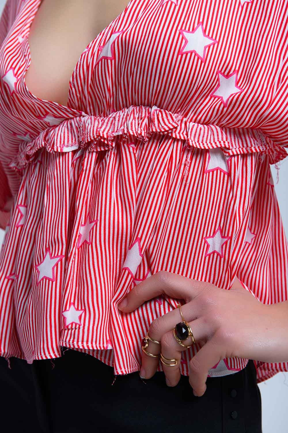 Red top with stars and ruffle