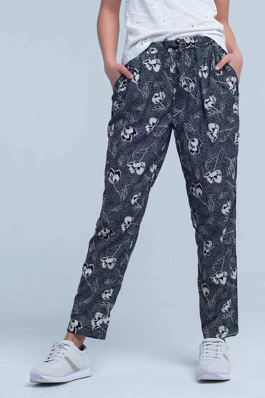 Black pants with floral print - trousers