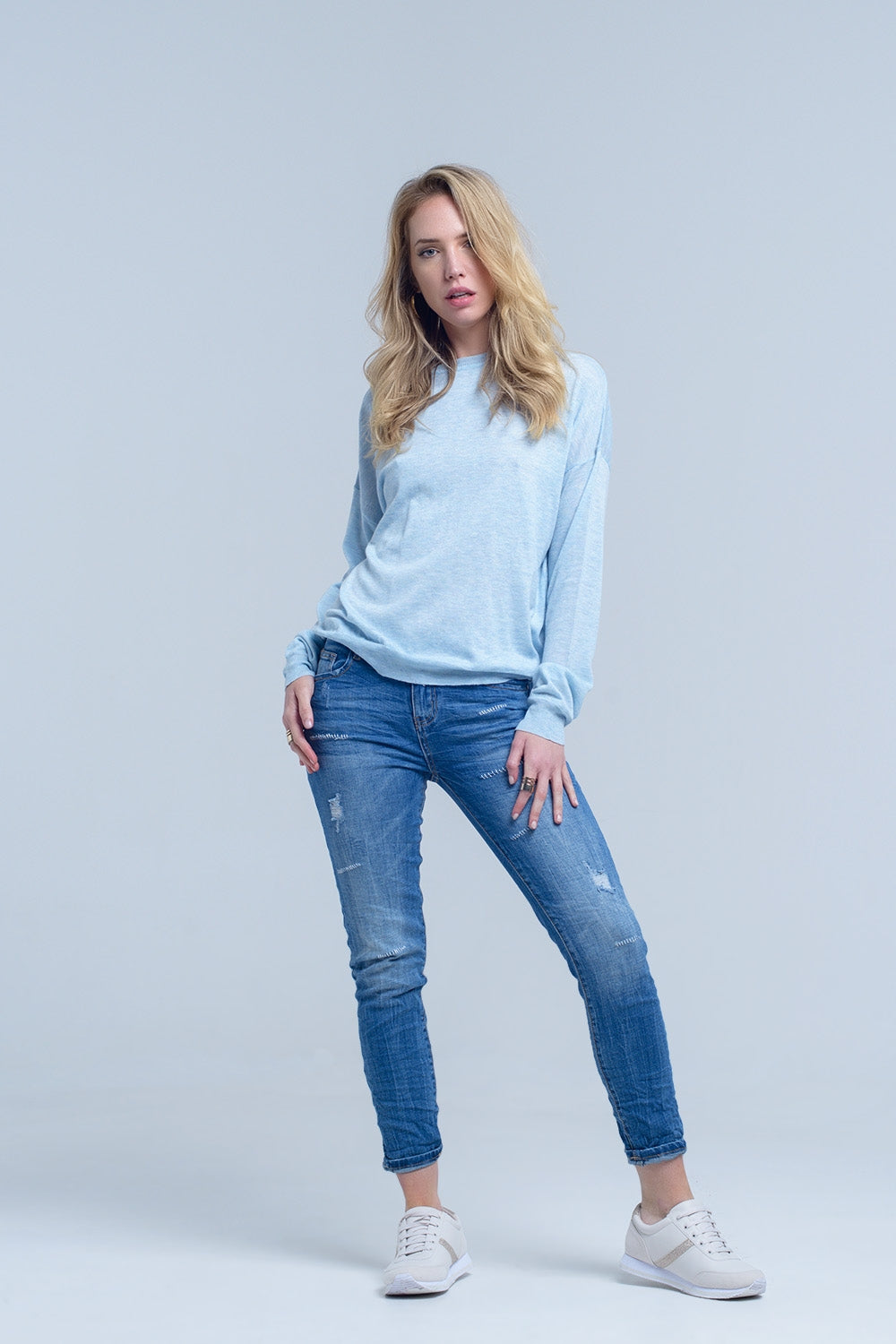 Ankle jeans with rip and repair - Denim