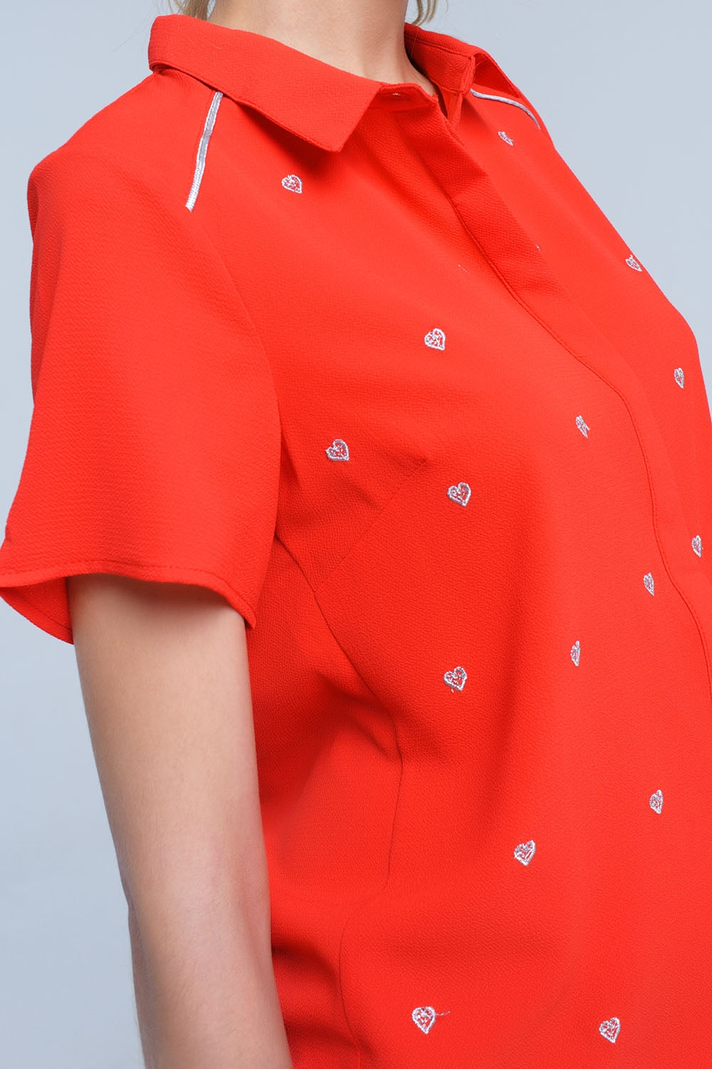 Red shirt with heart embroidery