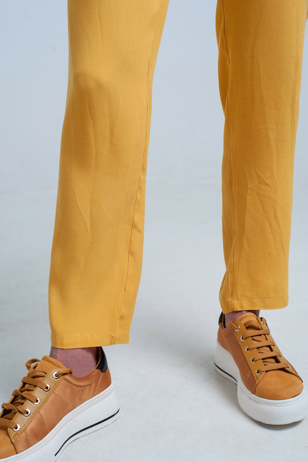 Mustard slim fit pants with satin belt