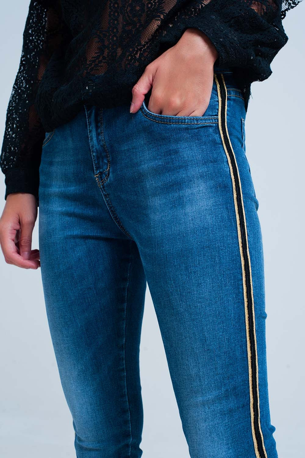 Blue denim pants with gold and black sideband