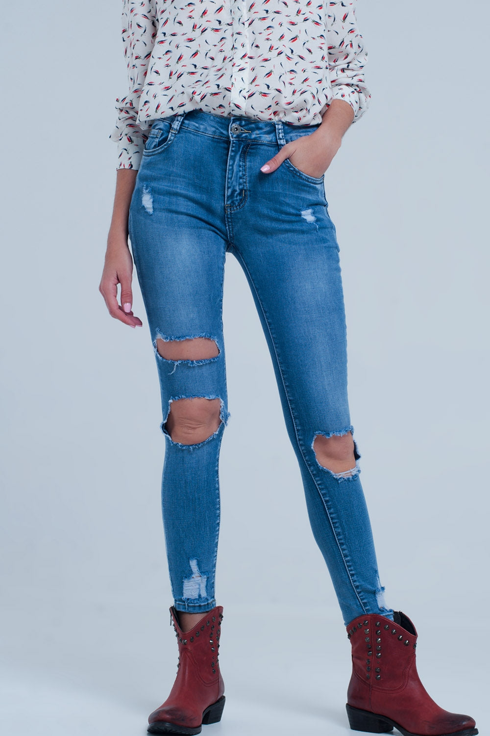 Light ripped skinny jeans in blue